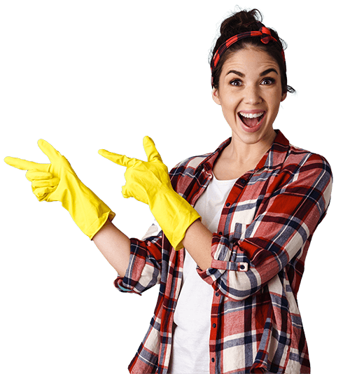 A smiling woman in a plaid shirt and yellow cleaning gloves points enthusiastically, conveying a sense of joy and energy. The background is dark, highlighting her cheerful expression.